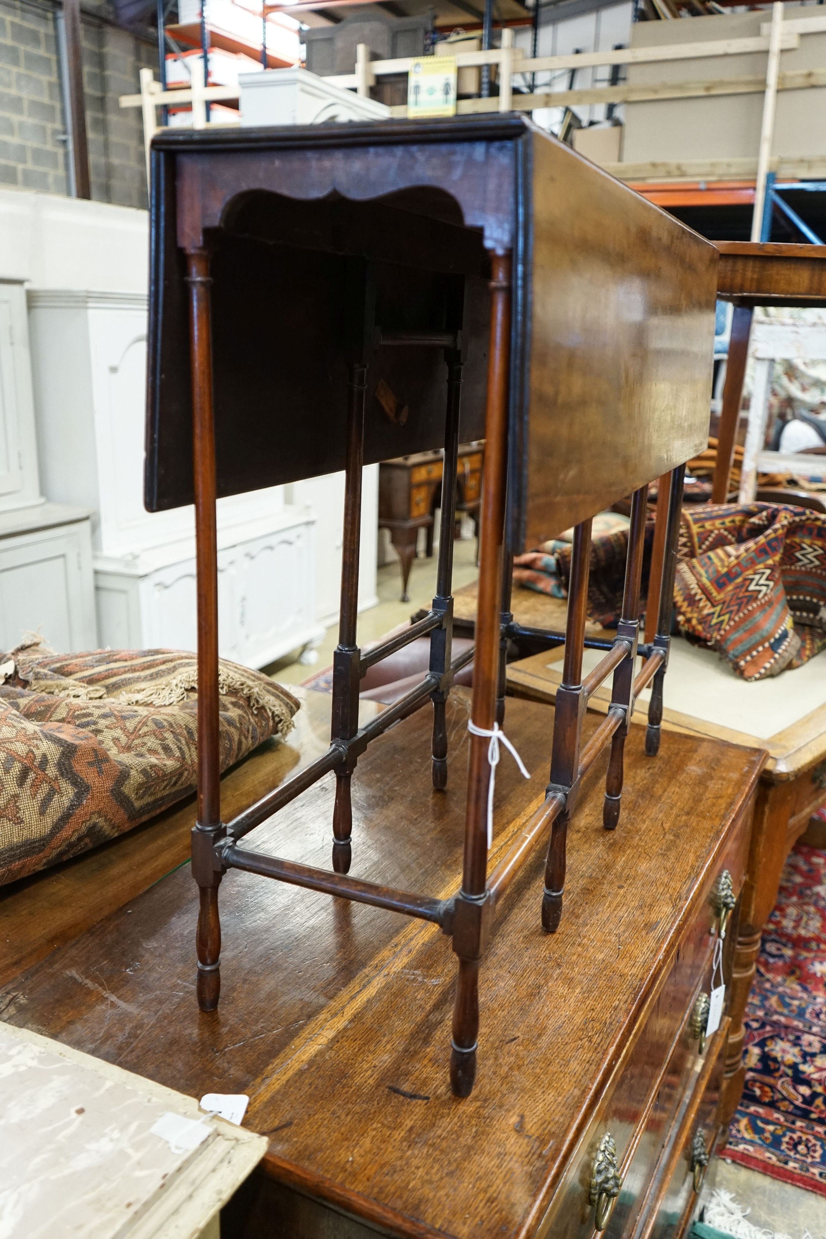 An Edwardian mahogany spider leg table, width 83cm, depth 29cm, height 72cm